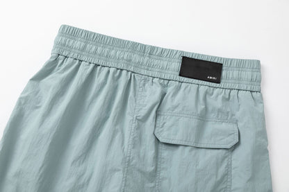 AMIRI Starburst logo shell swim shorts