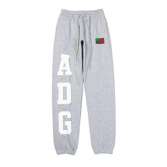 Denim Tears ADG Pan African American Flag Pants